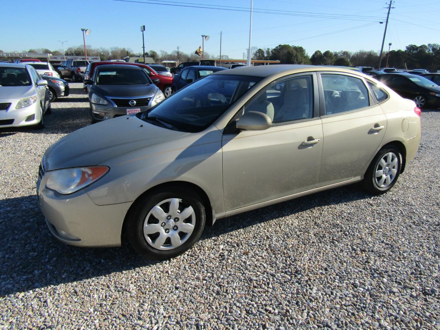 2008 Gold /Tan Hyundai Elantra GLS (KMHDU46DX8U) with an 2.0L L4 DOHC 16V engine, Automatic transmission, located at 15016 S Hwy 231, Midland City, AL, 36350, (334) 983-3001, 31.306210, -85.495277 - Photo#2